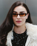 Mira Ecaille sunglasses — butterfly frame, worn by a woman