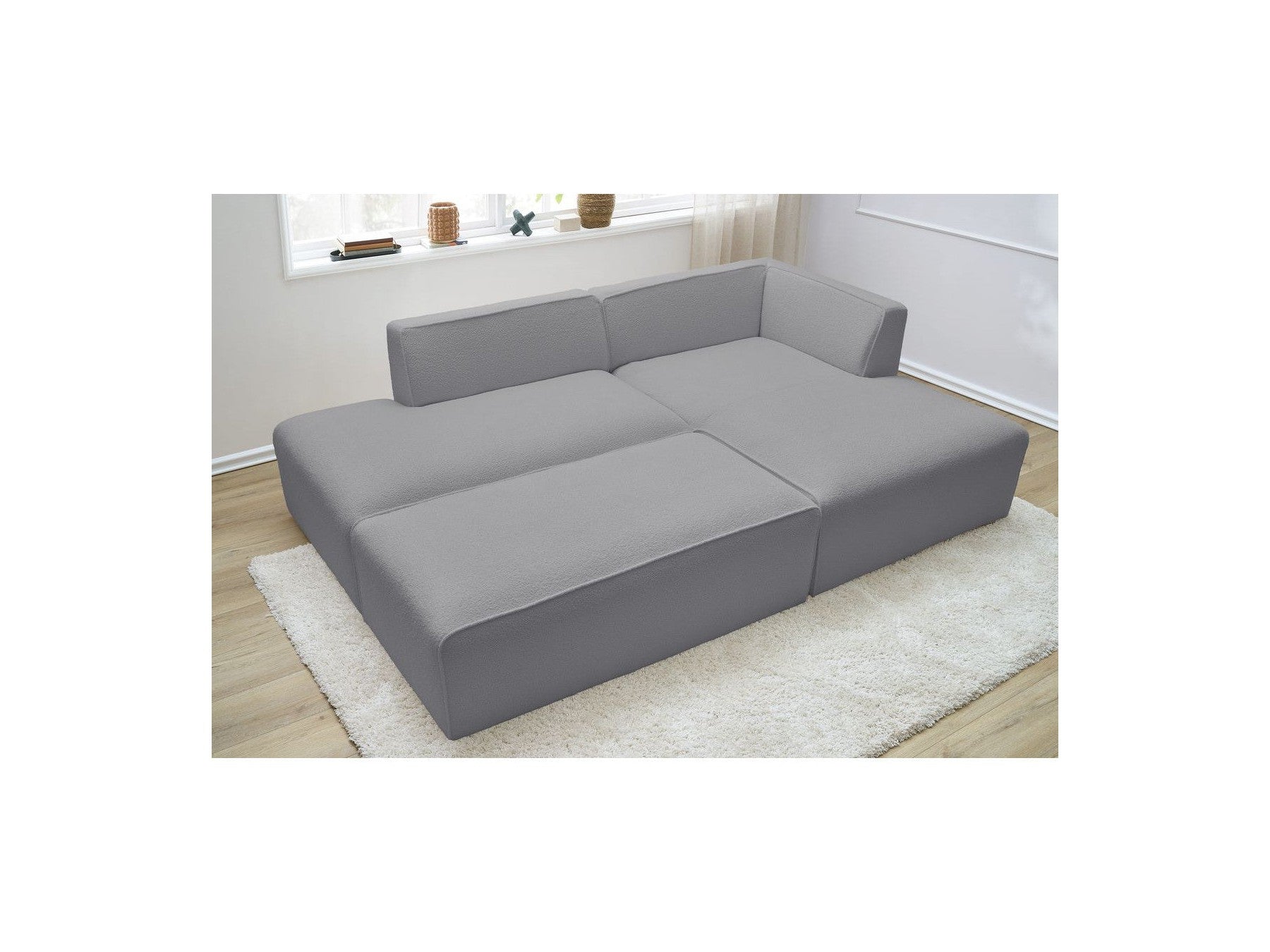 Megeve - Sofá esquinero fijo modular - Tela bouclé - Con puf - Esquina derecha