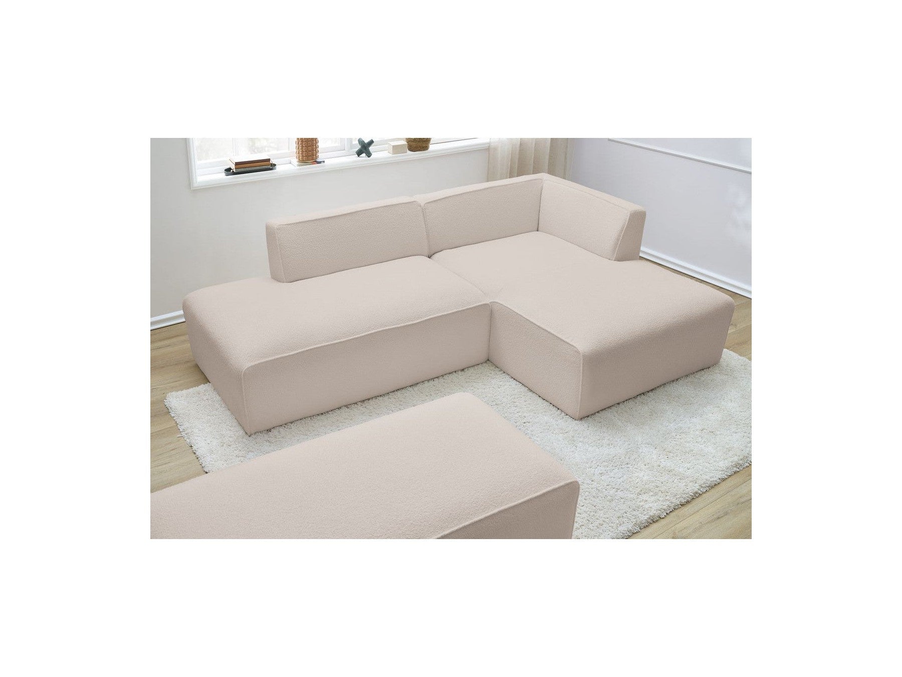 Megeve - Sofá esquinero fijo modular - Tela bouclé - Con puf - Esquina derecha