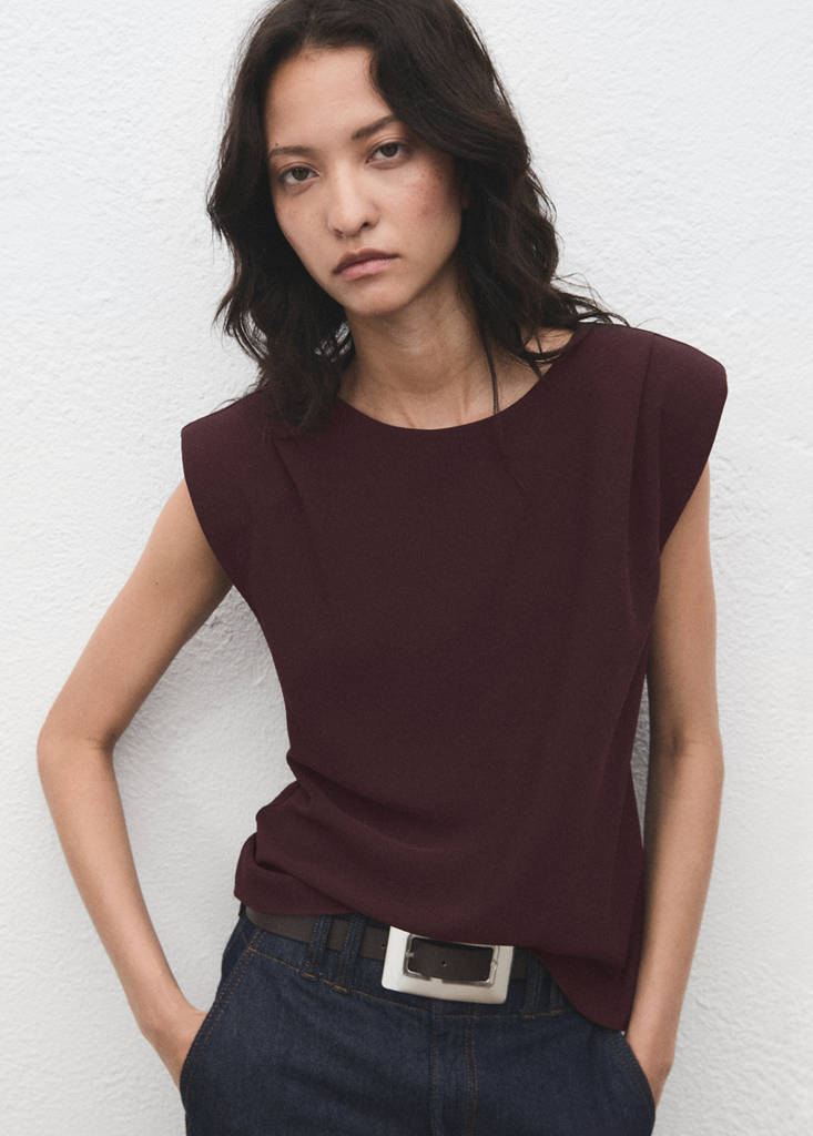 Bluse mit gerafften Schulterpolstern