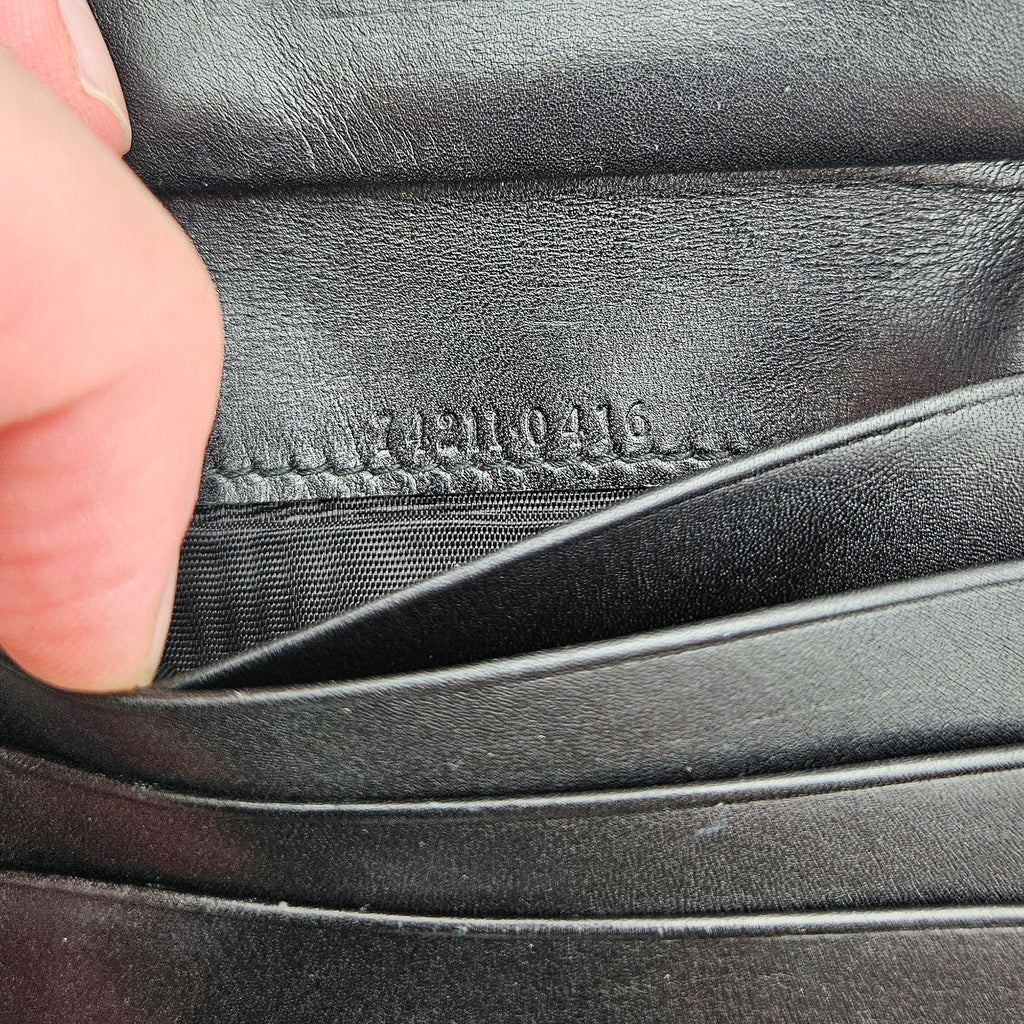 Cartera compacta con monograma Gucci Gg