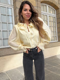 Brune light yellow blouse