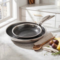 Hera - Set De 2 Poêles Triplex Antiadhésive - 20/28Cm - Noir/Argenté
