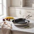 Hera - Set De 2 Poêles Triplex Antiadhésive - 24/32Cm - Noir/Argenté