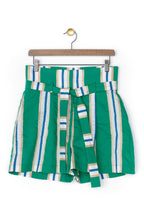 Los pantalones cortos verdes Kelly
