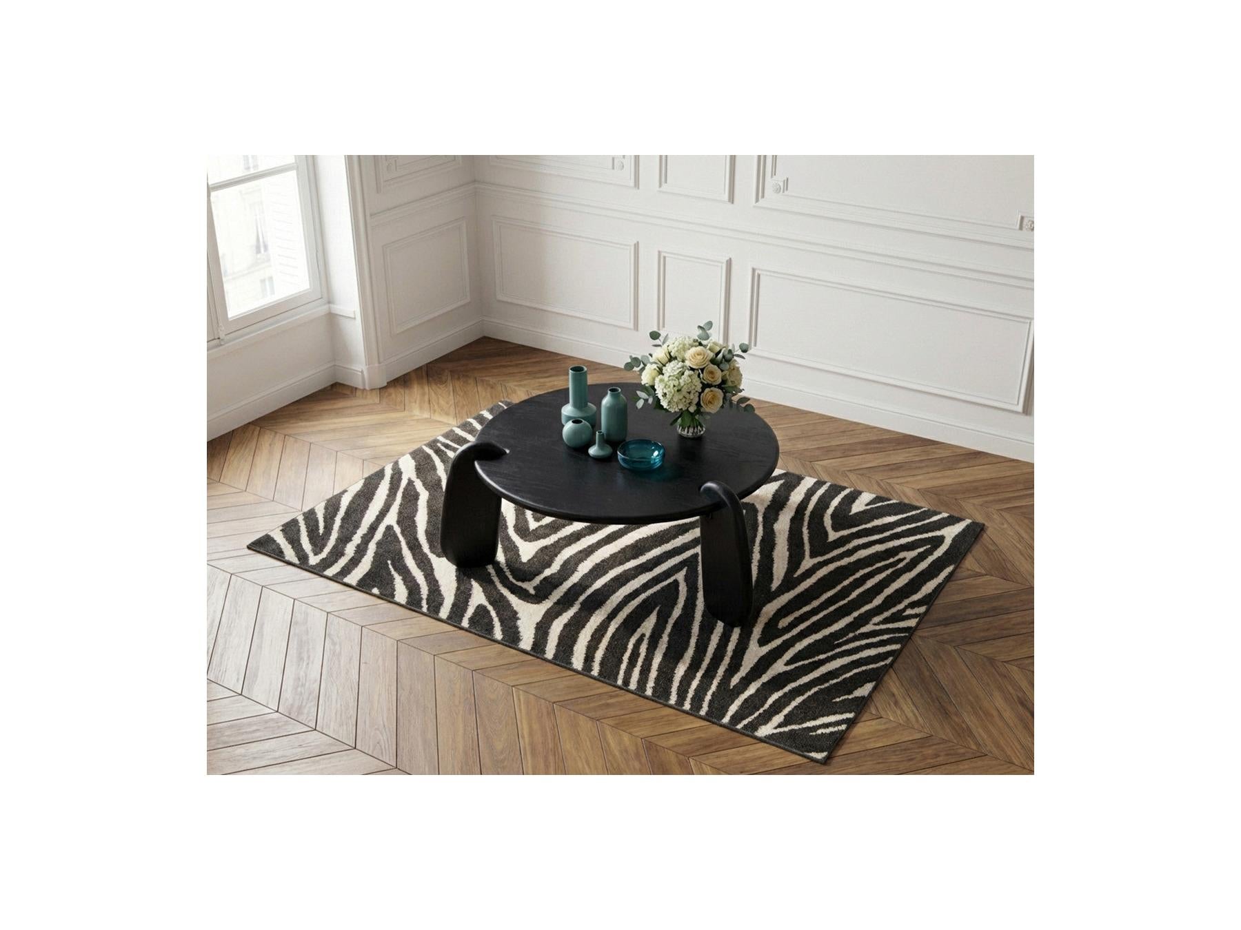 Helio - Mesa de centro redonda Helio de madera maciza de mango
