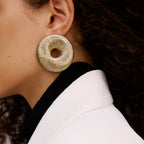 Close-up of a model wearing Boho Gold Silver Earring featuring a refined circular design and metallic threads.
