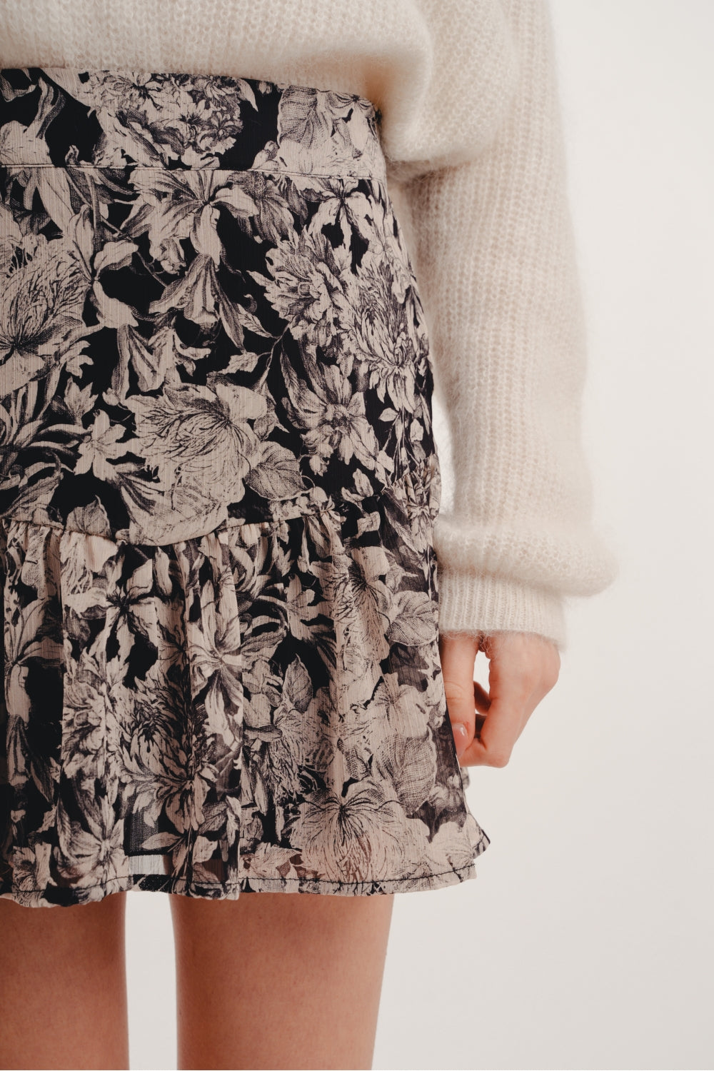 The Rita Black Flower Mini Skirt