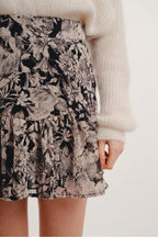 The Rita Black Flower Mini Skirt