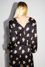 Blusa cruzada reversible con margaritas de The Lucky Cat