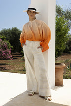 Blusa naranja anudada y teñida de Paola