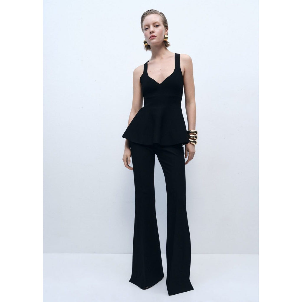 Top de punto fino con peplum