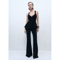 Top de punto fino con peplum