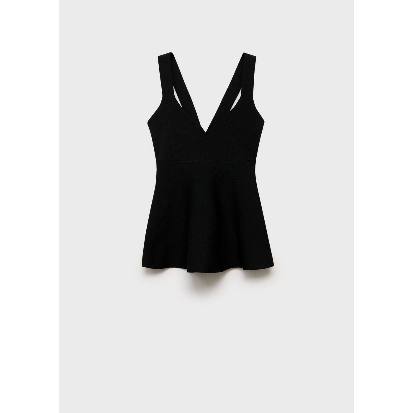 Top de punto fino con peplum