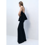 Top de punto fino con peplum