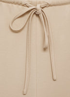Wide-leg trousers with elasticated waist - Natural