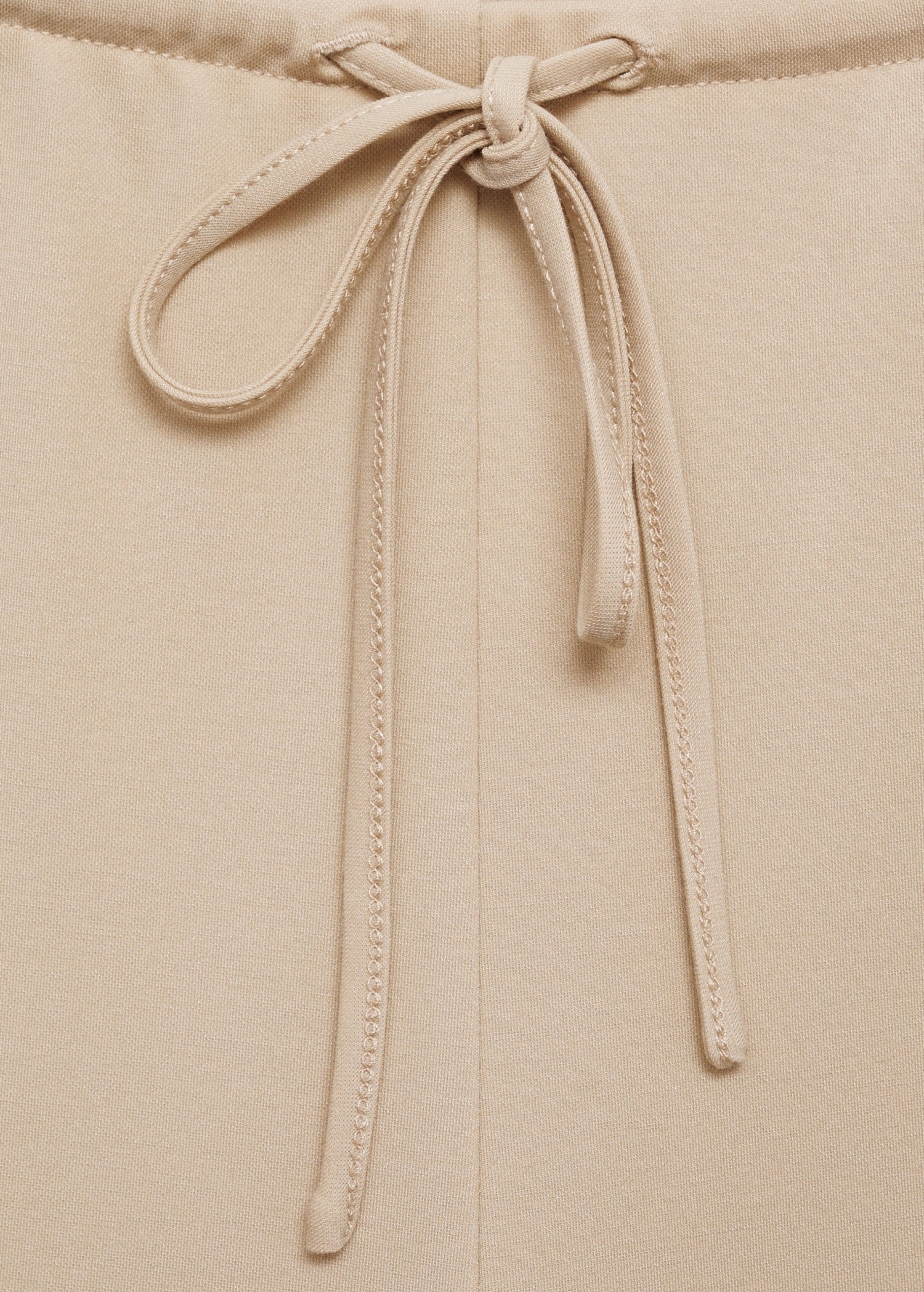Wide-leg trousers with elasticated waist - Natural