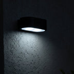 Noxis - Decorative Solar Wall Light - Steel - Black