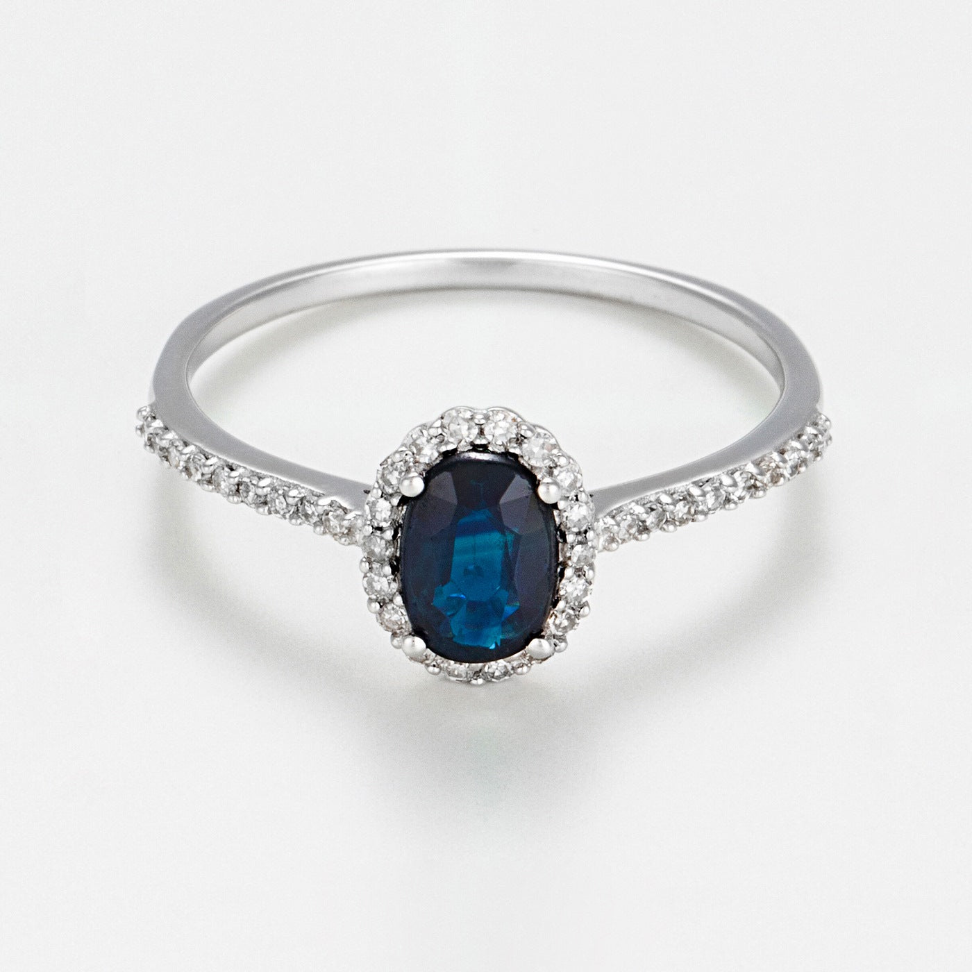 "Courtesy" Ring D0.14/36 Sapphire 0.6 - 375/1000 White Gold