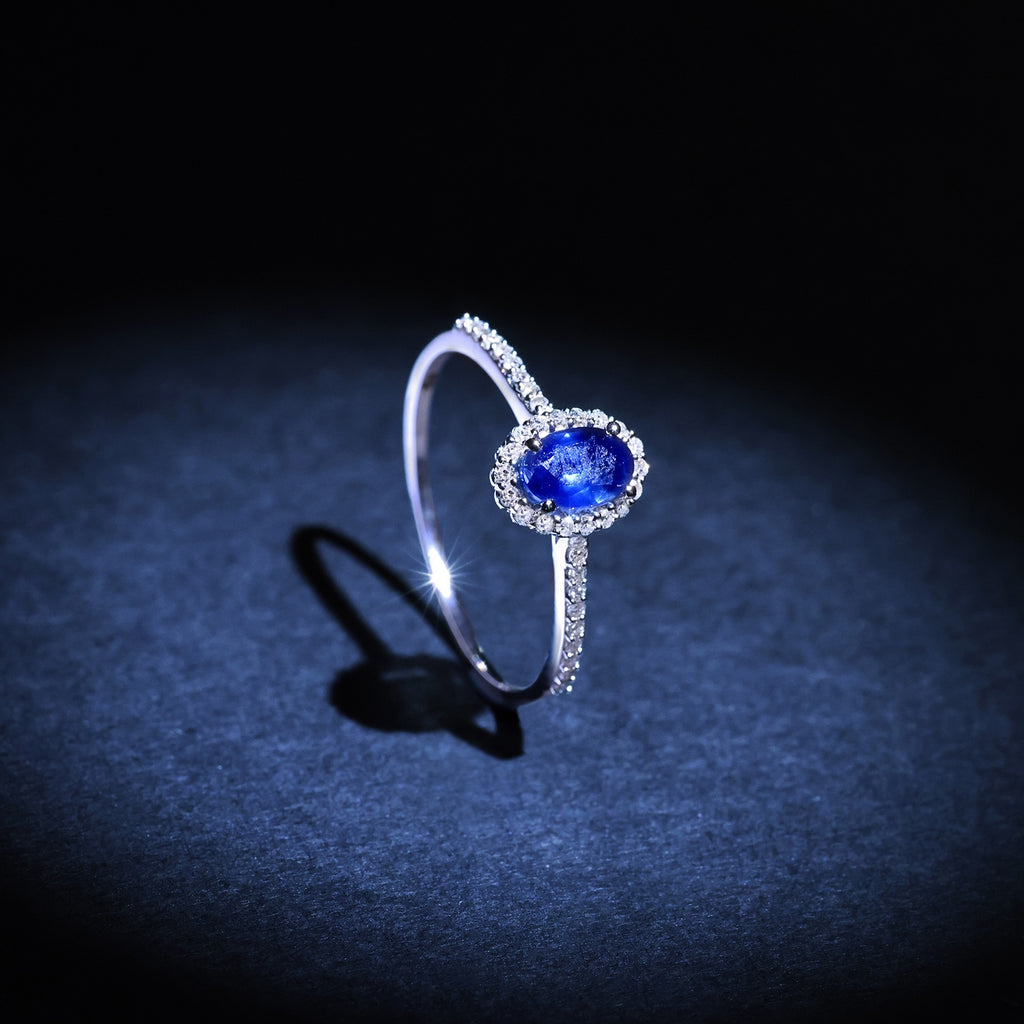 "Courtesy" Ring D0.14/36 Sapphire 0.6 - 375/1000 White Gold