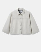 Oversized jacket in light granite undyed denim, straight cut with classic collar and front buttons, comfortable and breathable 100% cotton material.