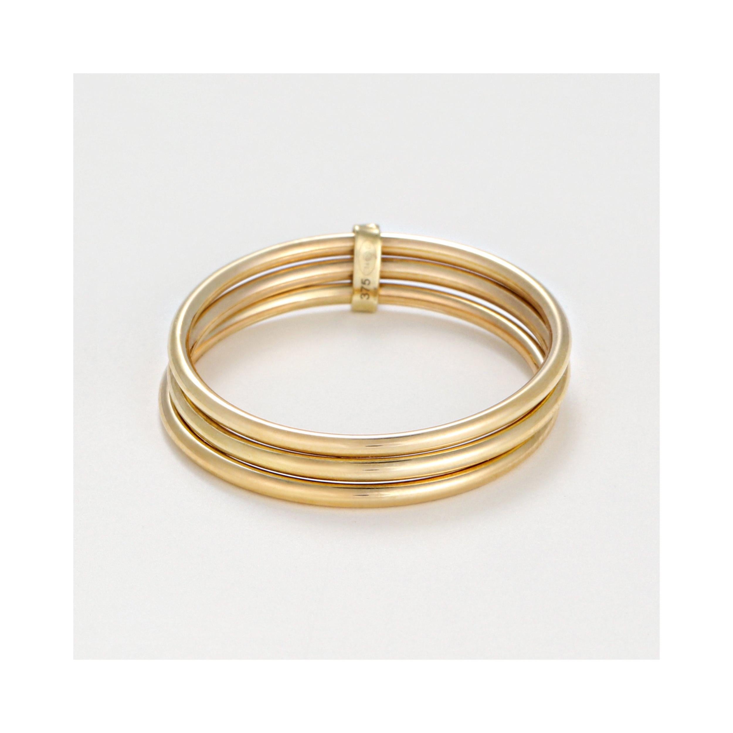 375/1000 Yellow Gold “Trinity” Ring