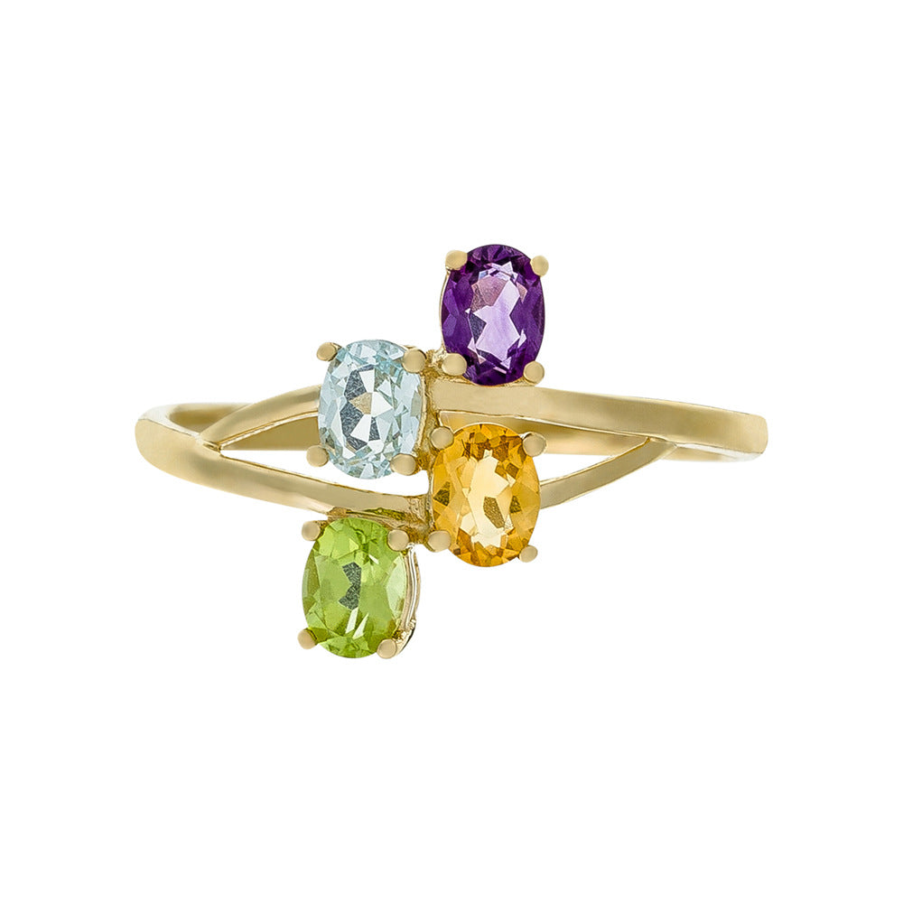 Anillo “Bornéo” Amatista 0.18/1, Topacio Azul 0.24/1, Citrino 0.18/1 y Peridoto - Oro amarillo 375/1000