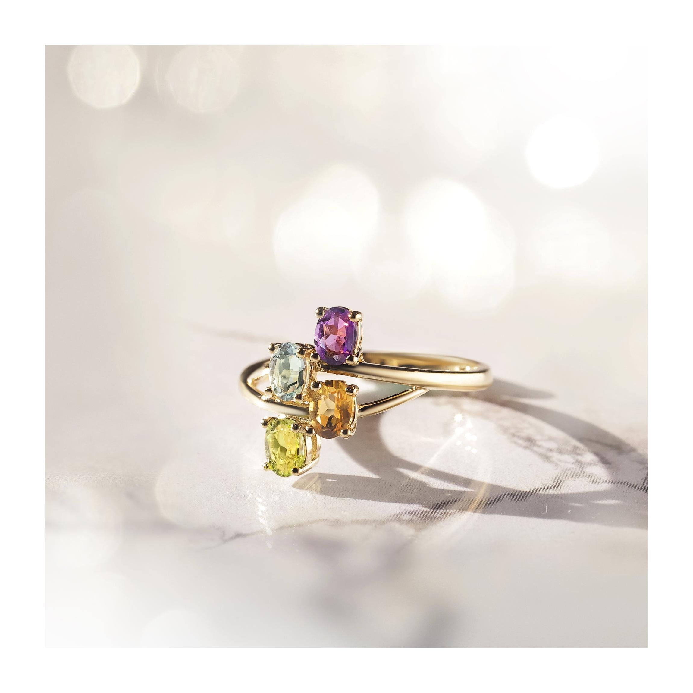 Anillo “Borneo” Amatista 0.18/1, Topacio Azul 0.24/1, Citrino 0.18/1 Y Peridoto