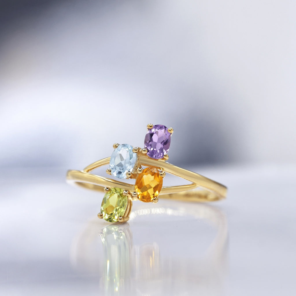 "Borneo" Ring: Amethyst 0.18/1, Blue Topaz 0.24/1, Citrine 0.18/1 and Peridot - 375/1000 Yellow Gold