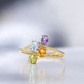 "Borneo" Ring: Amethyst 0.18/1, Blue Topaz 0.24/1, Citrine 0.18/1 and Peridot - 375/1000 Yellow Gold