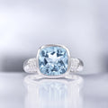 Bague "Lagon" Topaze Bleue Diamants 0,17/18 Tb 5,28/1 - Or Blanc 375/1000