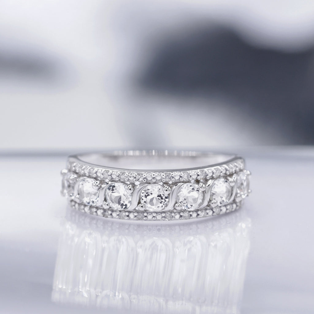"Sitra" Ring, D 0.08/24, White Topaz 1.16/7 - 375/1000 White Gold
