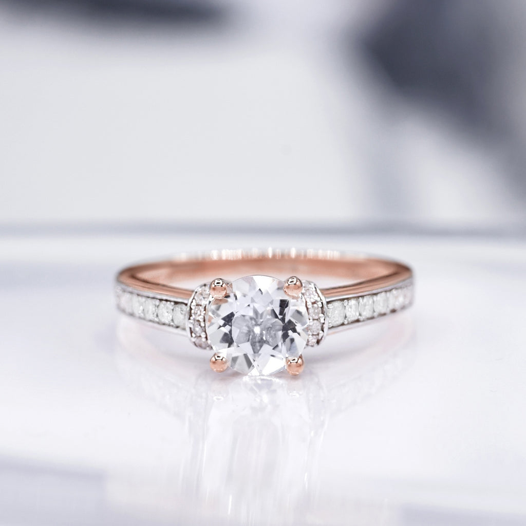 "Chera" ring D 0.291/40 White Topaz 1.573/1 - 375/1000 Rose Gold