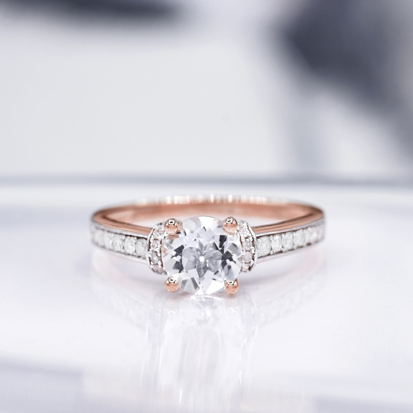"Chera" ring D 0.291/40 White Topaz 1.573/1 - 375/1000 Rose Gold