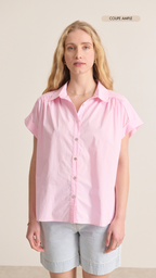 Flowy sleeveless poplin shirt with subtle gathers and elegant cut in soft pink color spring summer collection