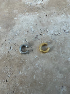 Ear cuff attorcigliato