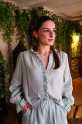 blusa asiática