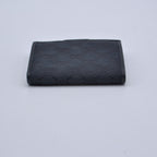 Cartera compacta con monograma Gucci Gg