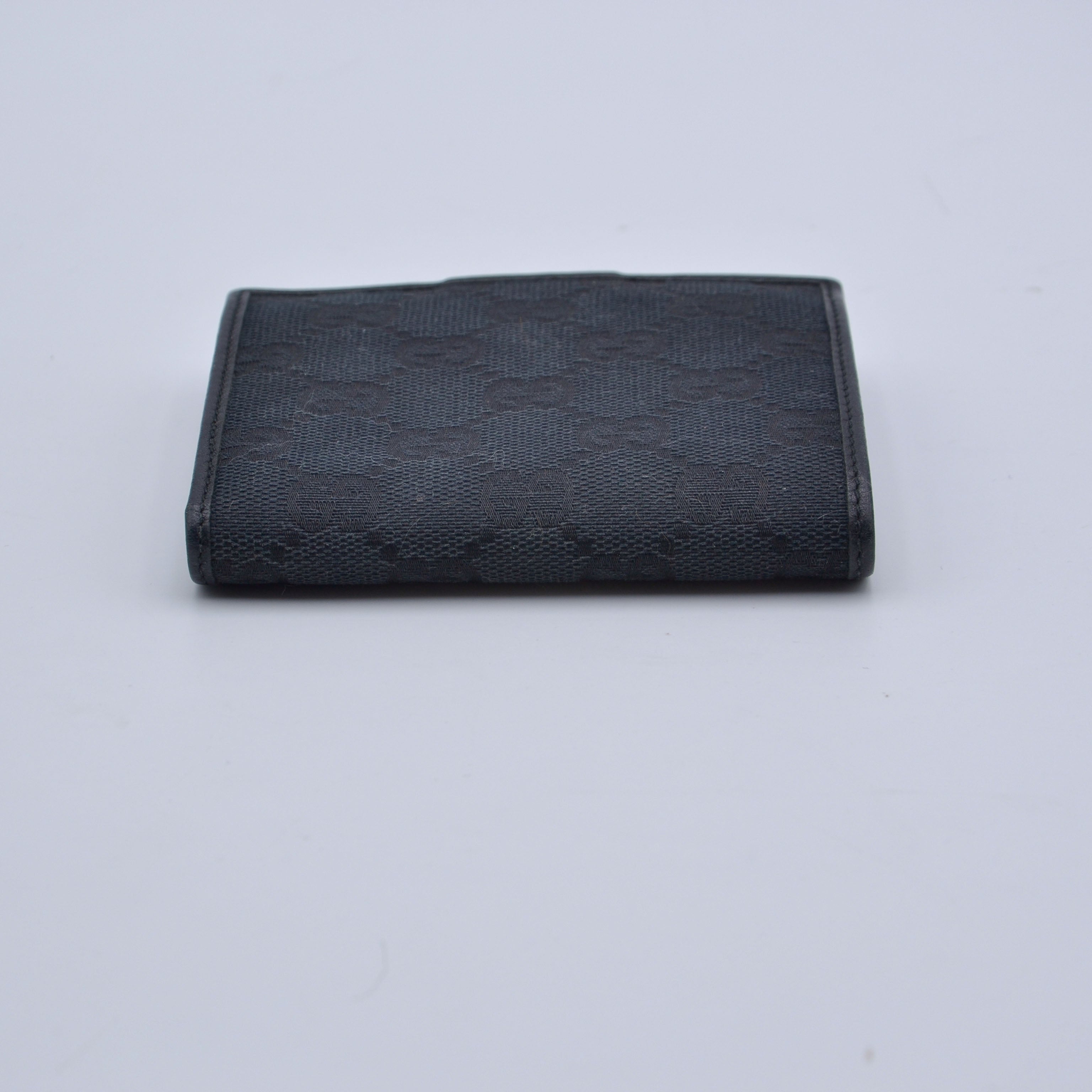 Cartera compacta con monograma Gucci Gg