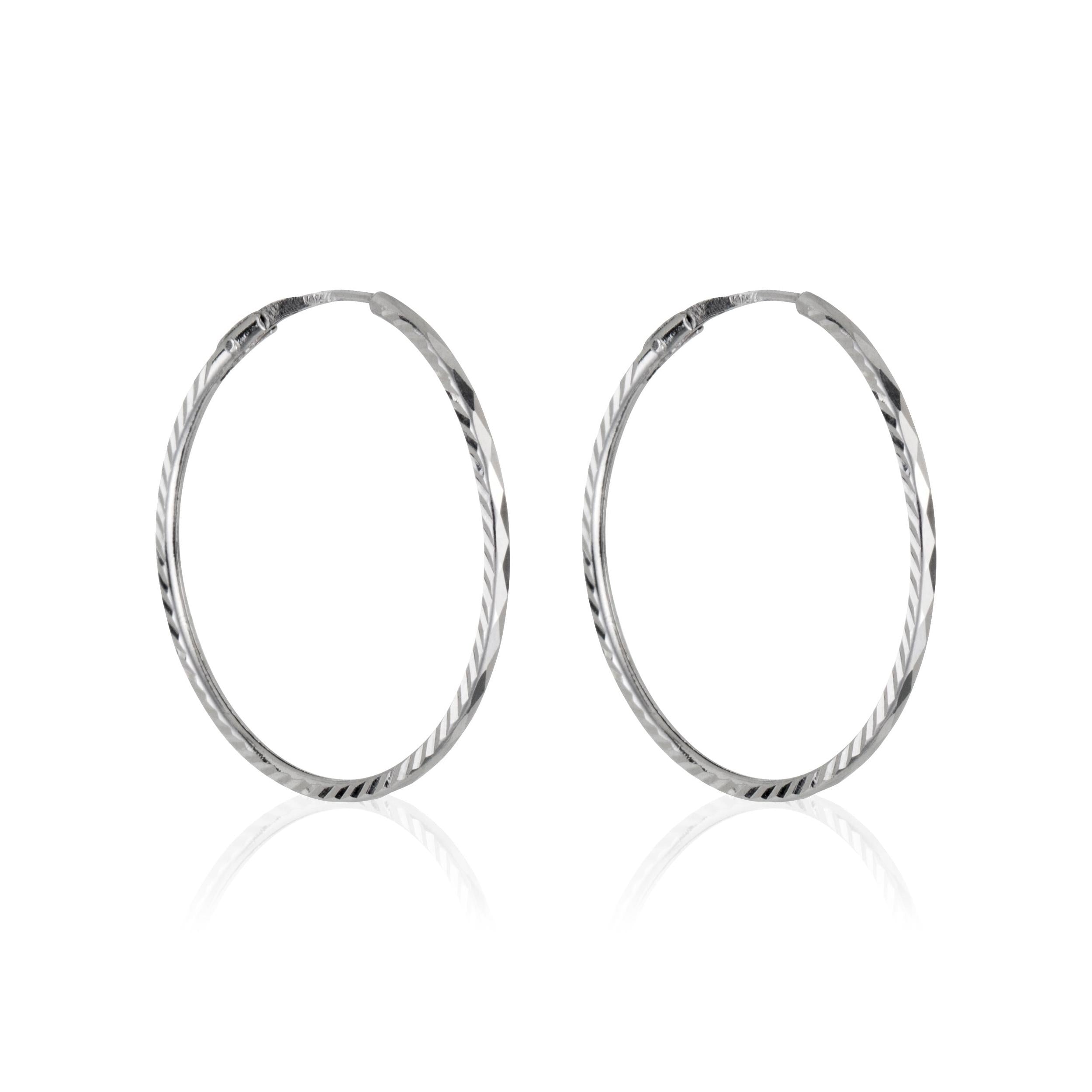 Pendientes Oro Blanco 375/1000 “20 Mm Criollas Torcidas”