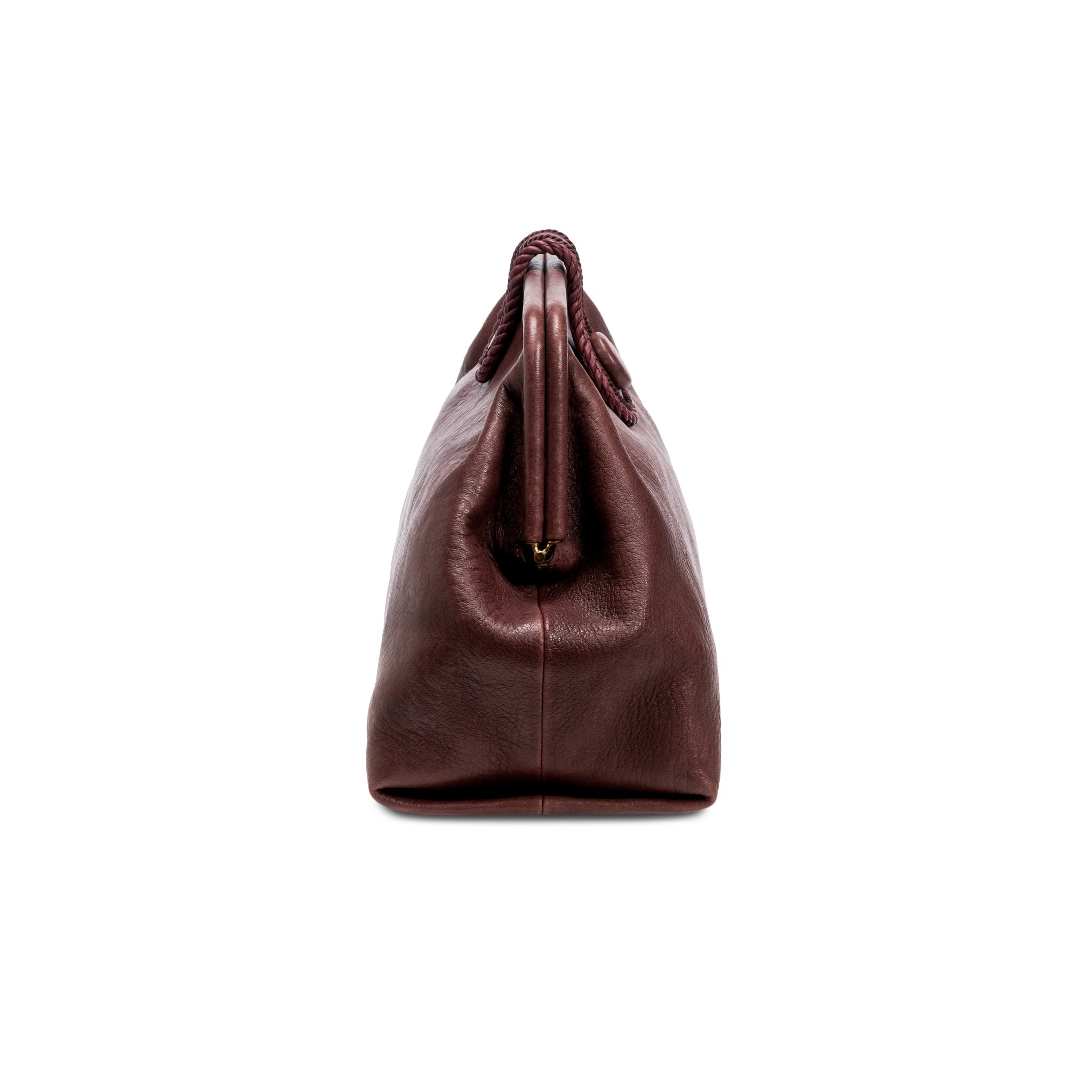 Burgundy in a shade of dark cherry leather handbag with a rope closure on a white background