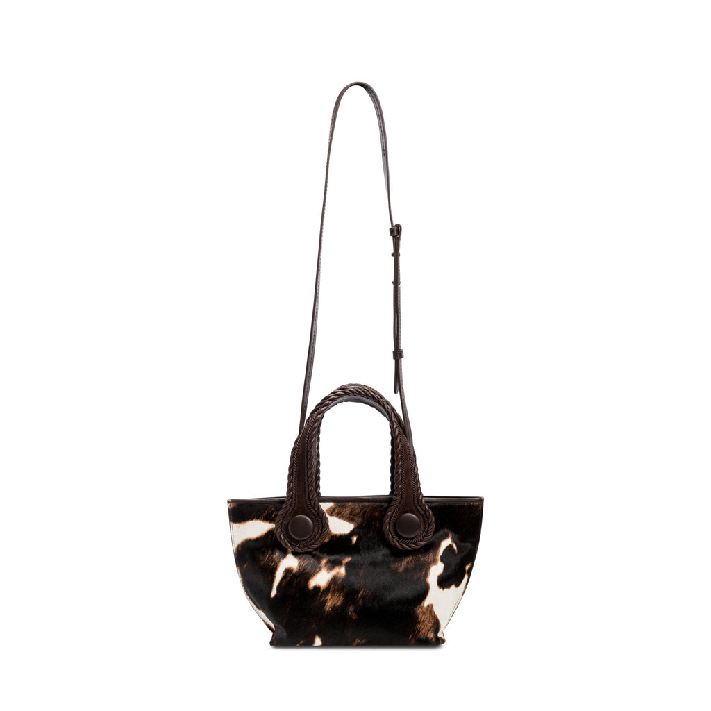 Dark brown and cream cow print pattern small tote bag with dark brown rope handles on a white background. It has a dark brown removable shoulder strap.
