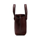 Burgundy leather in a shade of dark cherry tote bag with  an open rope handles on a white background, shown from the side.