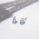 Boucles D'Oreilles "Azur" D0,08/2 Blue Topaze 0,48/2 - Or Blanc 375/1000