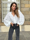Blusa Esmée con volantes crudo
