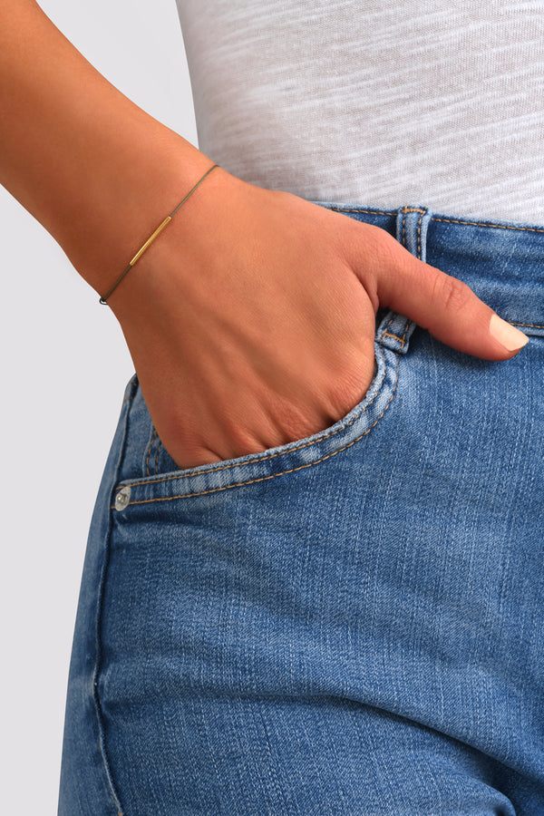 Pulsera de cordón fino blanco
