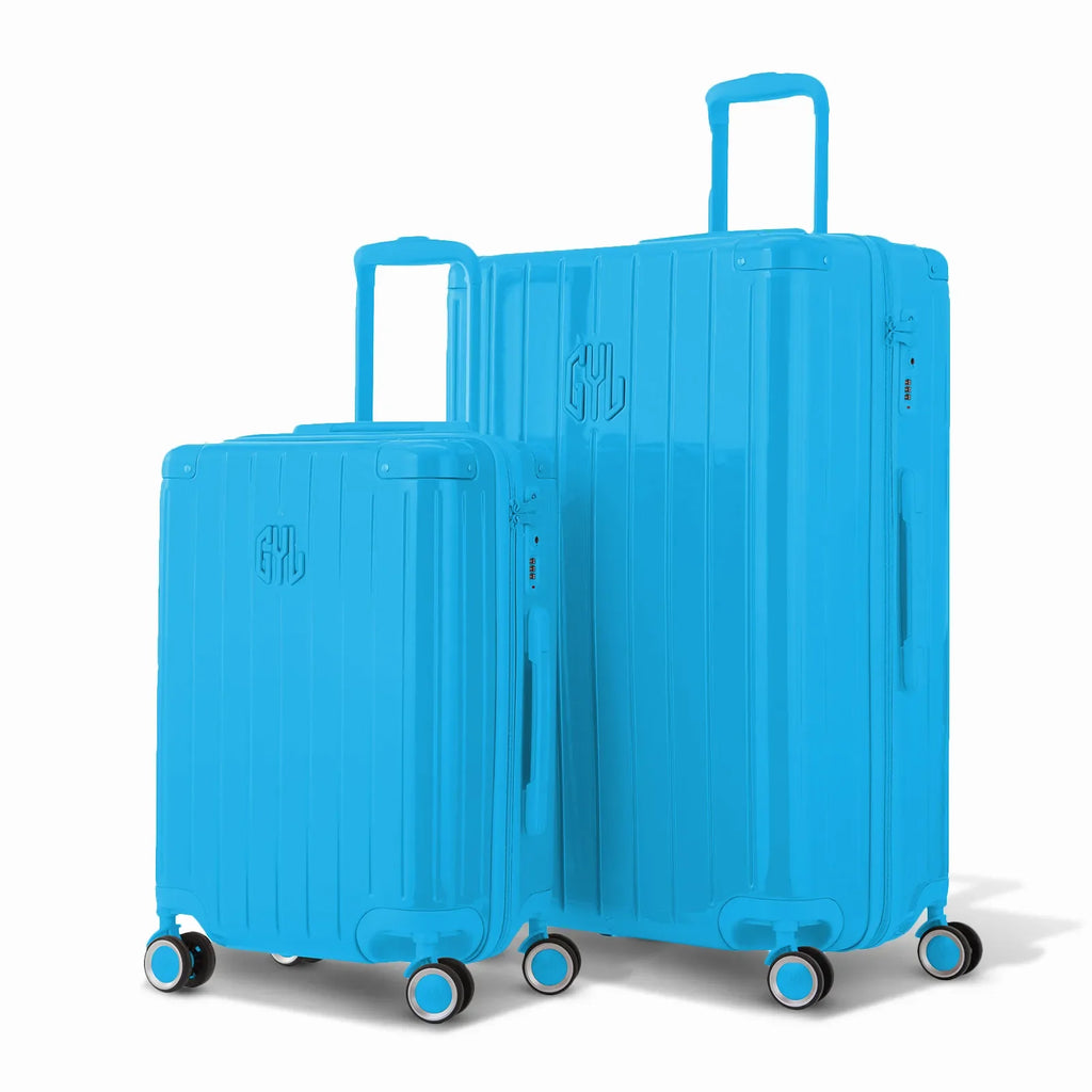 Duo de valises rigides GYL Intemporelle menthe avec coques nervurées et poignées télescopiques. #couleur_menthe
