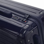 Fermeture à combinaison TSA et double curseur zippé GYL sur la valise rigide marine Intemporelle. #couleur_marine
