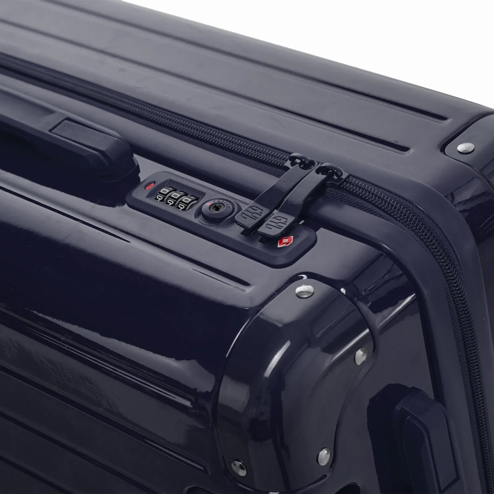 Fermeture à combinaison TSA et double curseur zippé GYL sur la valise rigide marine Intemporelle. #couleur_marine