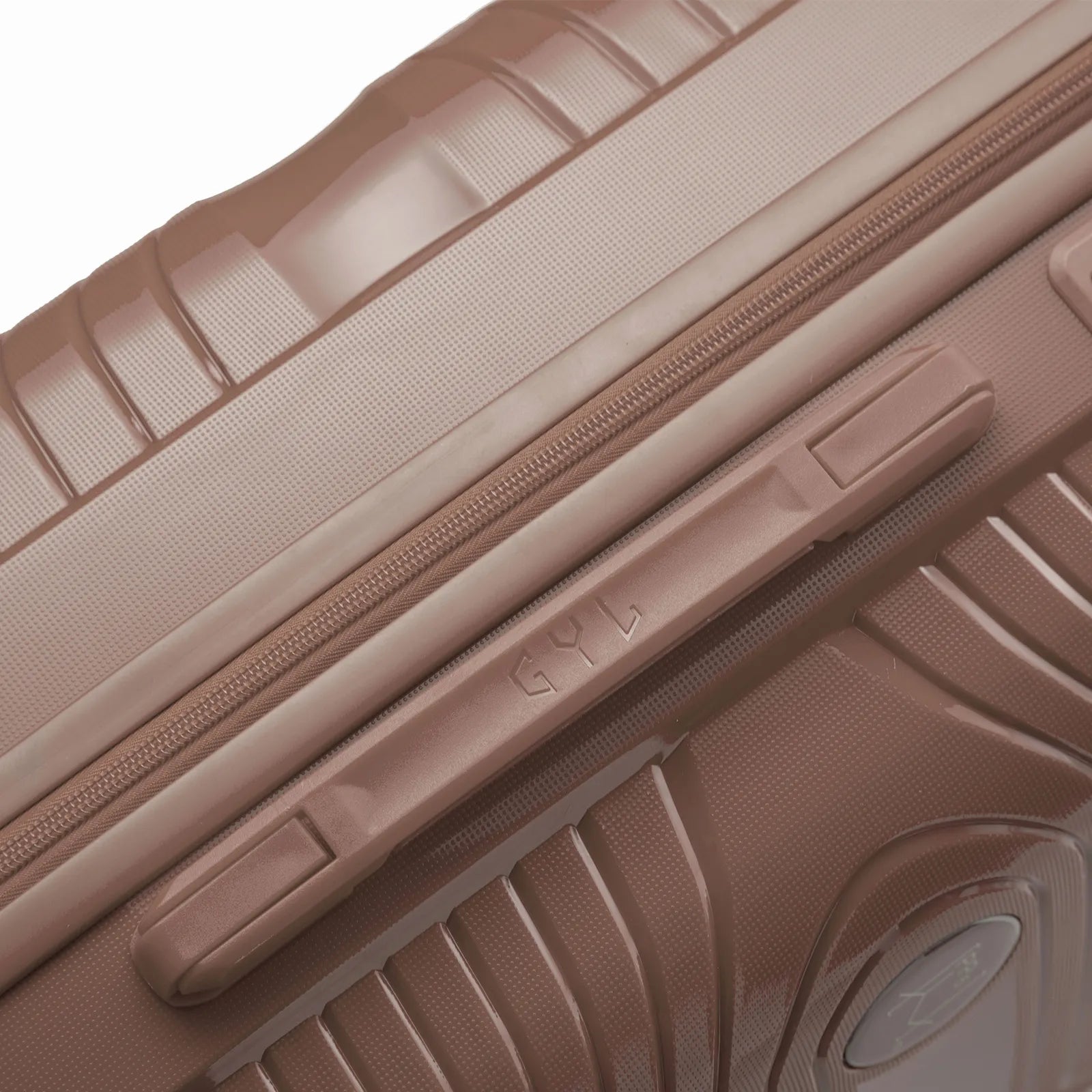 Detalle del asa lateral y del logo GYL en la maleta Signature champán. #couleur_champagne